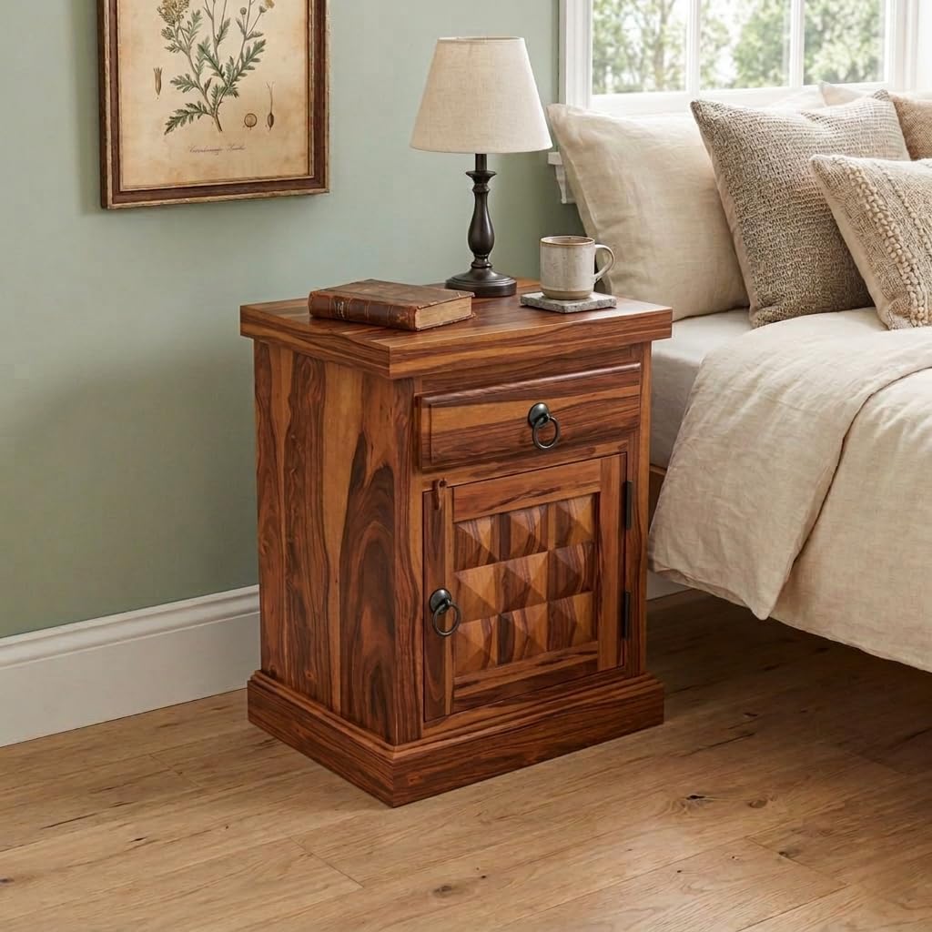 Bhagwati Art Diamond Sheesham wood bedside table in Honey finish beside a bed